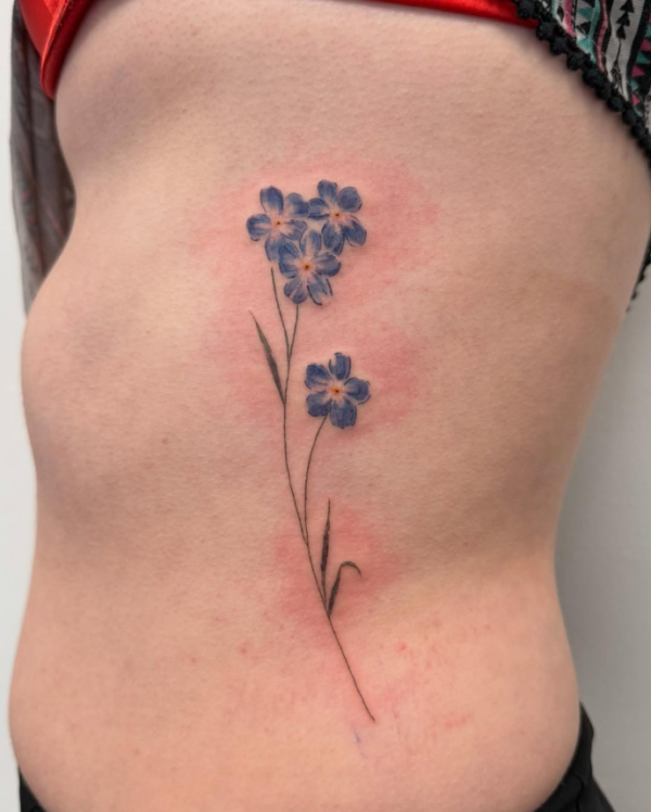 tatouage fineline floral